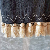 Black Raw Cotton Throw with White Stitched Hem and Beaded Tassels | 125×195cm